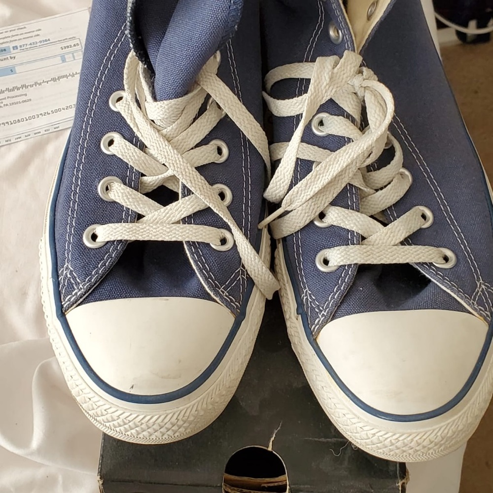 Men’s Size 11. Navy blue converse. Lightly worn.